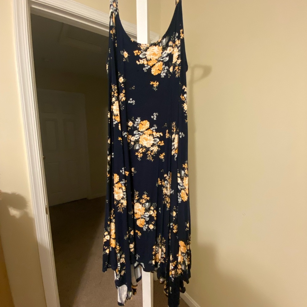 Dark blue asymmetrical midi dress with yellow roses.